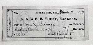 Picture of bank draft, A.K. & E.B. Yount Bankers, pay to Jas Sullivan by School Supt., filed F.C. Banks, March 2, 1874.