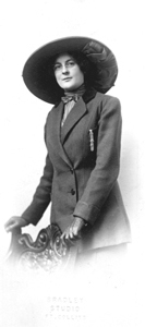 Young woman dressed in a suit, c. 1915