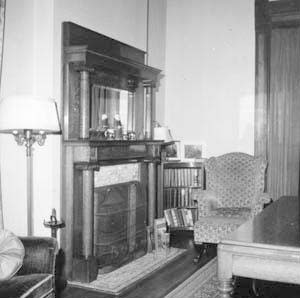 Southwest corner with fireplace and chair
