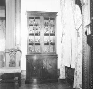 China cabinet on east wall