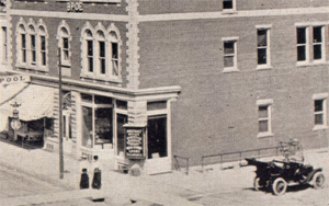Elks Building on the Corner of Linden and Walnut, showing stairs behind car, c. 1908